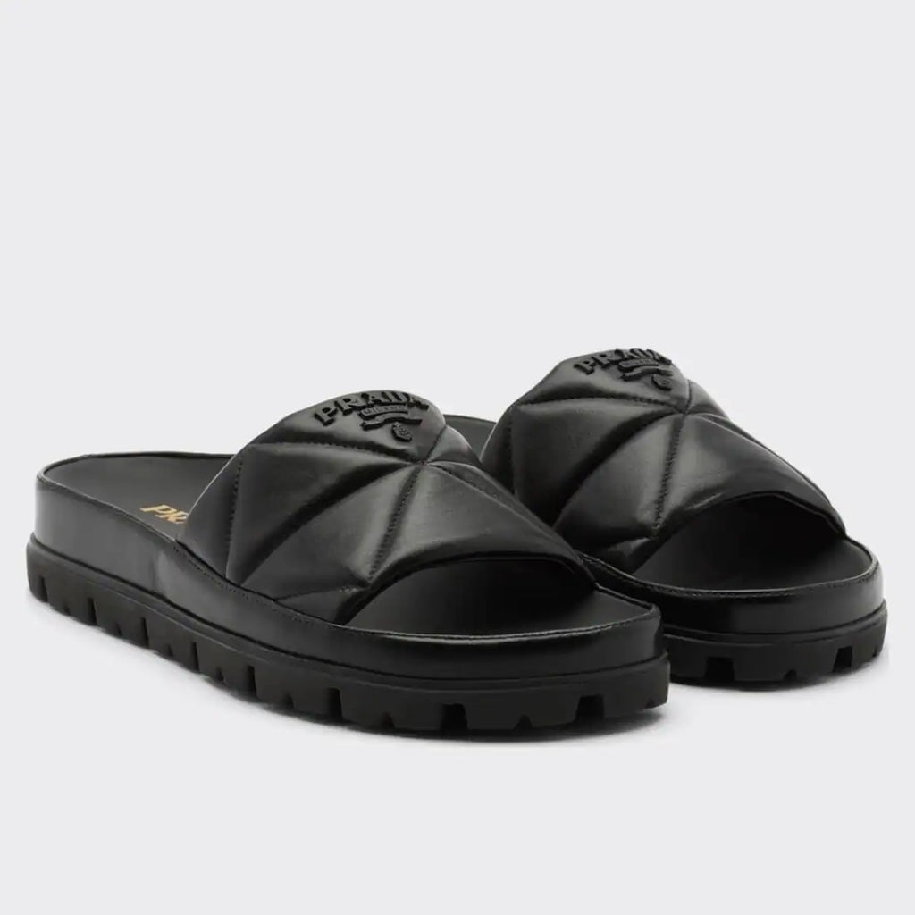 PRADA WOMEN’S SLIDES IN BLACK QUILTED NAPPA LEATHER – PSD083