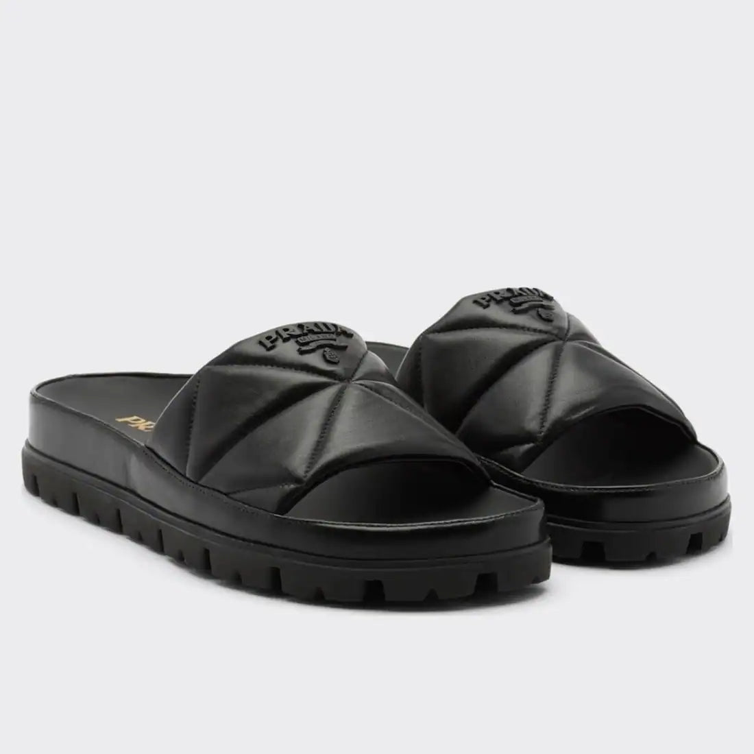 PRADA WOMEN’S SLIDES IN BLACK QUILTED NAPPA LEATHER – PSD083