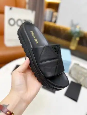 PRADA WOMEN’S SLIDES IN BLACK QUILTED NAPPA LEATHER – PSD083
