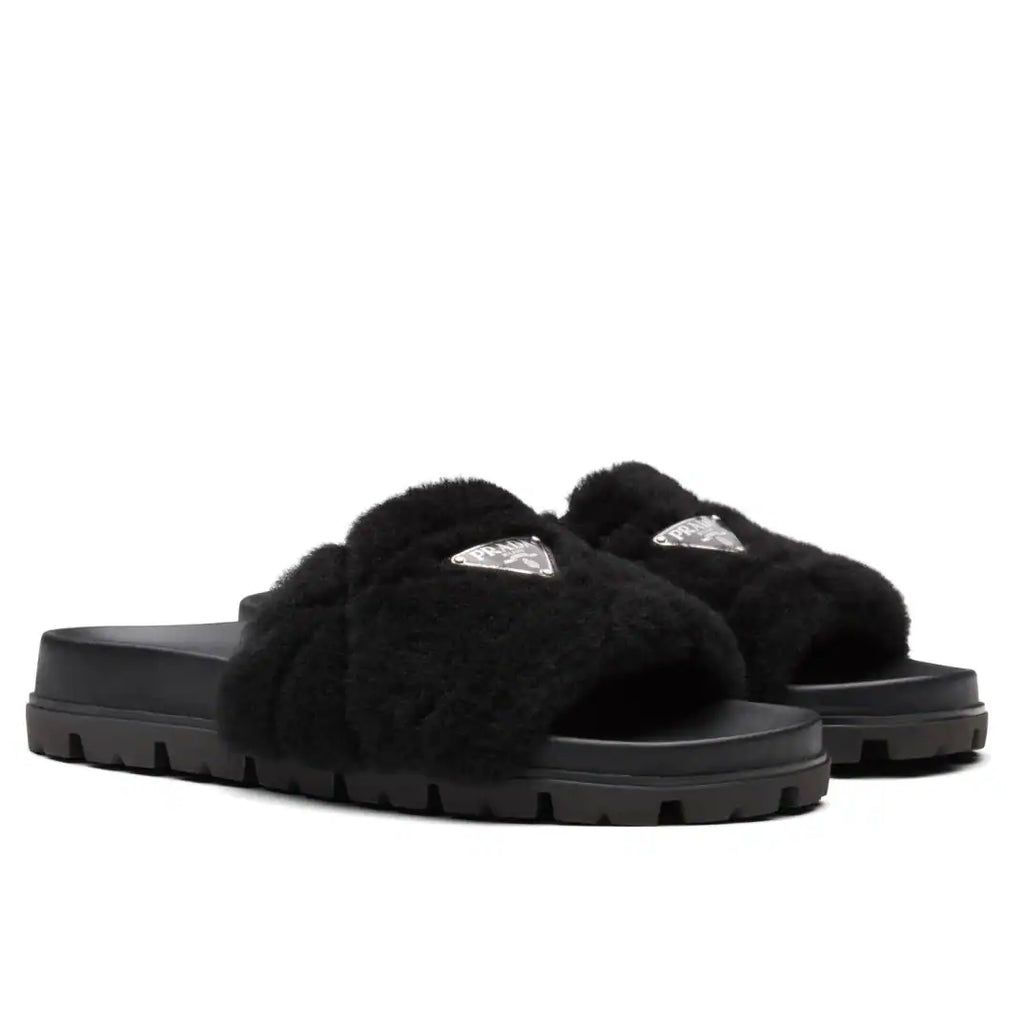 PRADA WOMEN’S SLIDES IN BLACK SHEARLING – PSD074