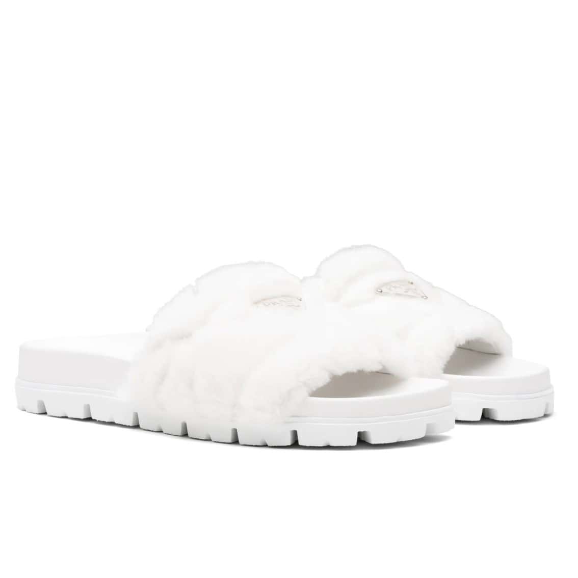 PRADA WOMEN’S SLIDES IN WHITE SHEARLING – PSD087