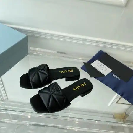 PRADA WOMEN’S SLIDES SANDALS IN BLACK NAPPA LEATHER – PSD061