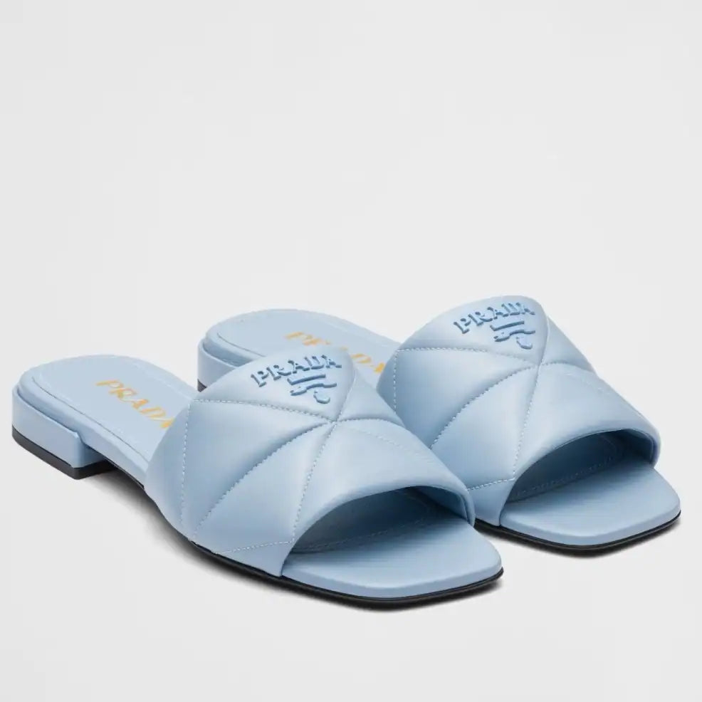 PRADA WOMEN’S SLIDES SANDALS IN LIGHT BLUE NAPPA LEATHER – PSD075