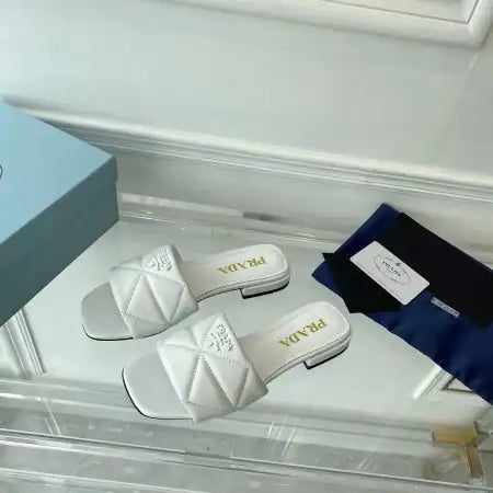 PRADA WOMEN’S SLIDES SANDALS IN WHITE NAPPA LEATHER – PSD077