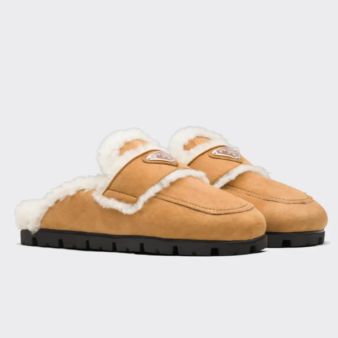 PRADA WOMEN’S SLIPPERS IN TAN SHEARLING – PSD050