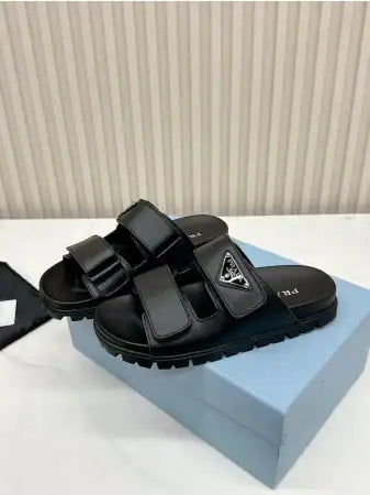 PRADA WOMEN’S STRAP SLIDES SANDALS IN BLACK CALFSKIN – PSD027