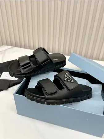 PRADA WOMEN’S STRAP SLIDES SANDALS IN BLACK CALFSKIN – PSD027