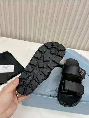 PRADA WOMEN’S STRAP SLIDES SANDALS IN BLACK CALFSKIN – PSD027