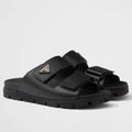PRADA WOMEN’S STRAP SLIDES SANDALS IN BLACK CALFSKIN – PSD068