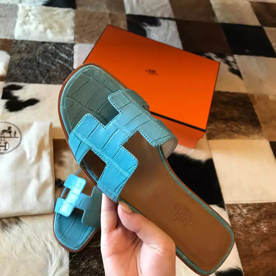 HERMES ORAN SLIDE SANDALS IN CELESTE SHINY NILOTICUS CROCODILE SKIN – HMSD048