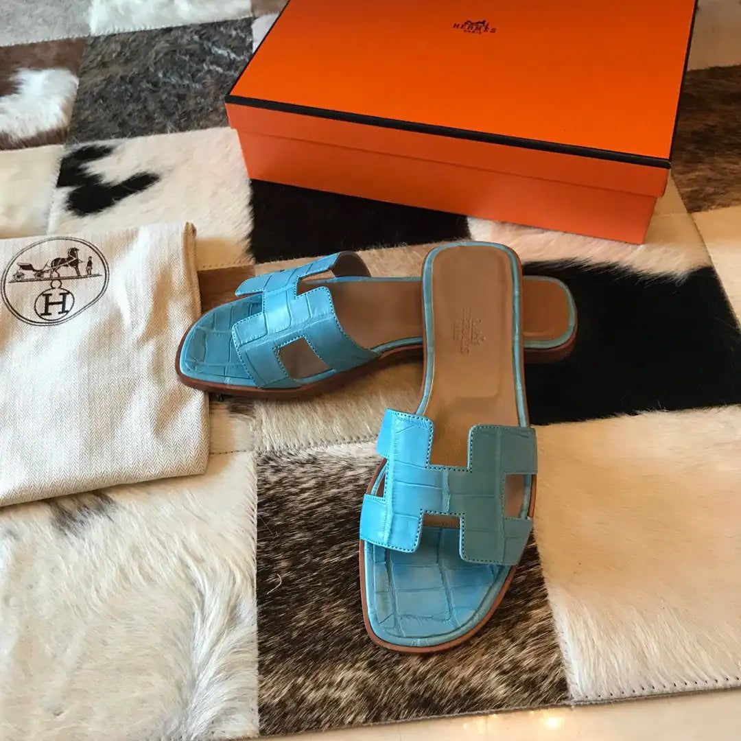 HERMES ORAN SLIDE SANDALS IN CELESTE SHINY NILOTICUS CROCODILE SKIN – HMSD048